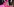 Sängerin Lady Gaga mit pinker Schleife im Haar und falschen Wimpern