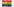 Ein Wandtuch mit den PACE-Regenbogenfarben. Darauf die Kontinente, ebenfalls in den Farben gehalten