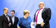 Scholz, Heil, Merkel und Altmaier bei einer Pressekonferenz.