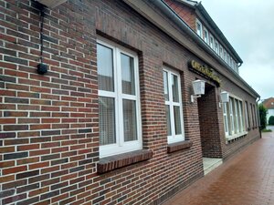 Die Fassade der alten Gaststätte König in Menslage Die Fassade der alten Gaststätte König in Menslage