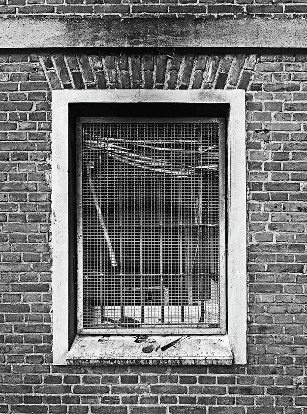 Ein Fenster einer Gefängniszelle Ein Fenster einer Gefängniszelle