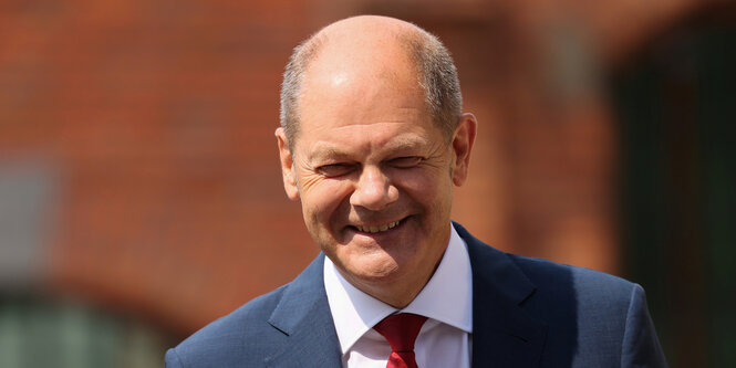 Finanzminister Olaf Scholz lacht.