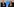 Joe Biden und Kamala Harris stehen nebeneinander und haben die Hand auf dem Herzen.
