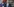 Joe Biden mit Luftballons vor einem Buchregal