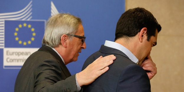 Der EU-Präsident klopft Griechenlands Ministerpräsident auf die Schulter.