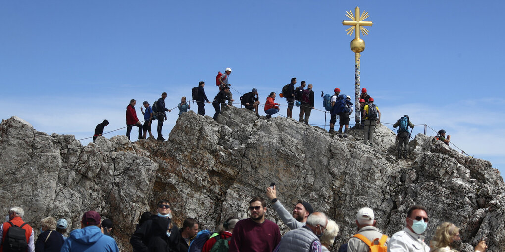 Menschen auf Berggipfewl