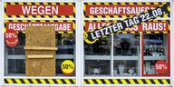 Düsseldorf: Der Schriftzug "Wir schliessen" steht am Schaufenster eines Geschäftes.