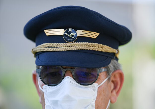 Pilot mit Mütze und Mundschutz Pilot mit Mütze und Mundschutz