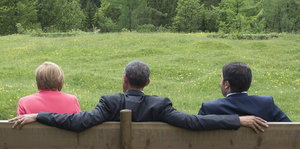 Merkel, Obama und Renzi auf einer Bank in Elmau