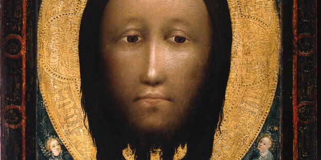 Das Gesicht von Jesus schwebt über einem goldenen Hintergrund