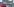 Claudia Roth steht vor dem Deutschen Bundestag