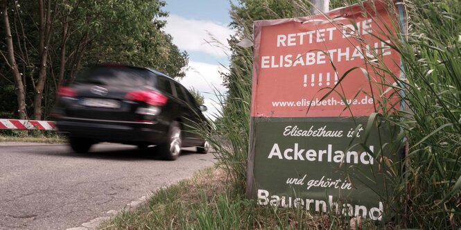 Protestschild gegen Wohnungsbau