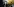 eine junge Frau sitzt mit Smiley-Luftballon in der U-Bahn