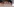 Gesicht einer Frau mit blauer Schutzkappe hinter 3 Probengläschen