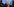 Wladimir Putin auf einer großen Leinwand - davor sitzen Journalisten