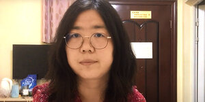 Die chinesische Anwältin und Bürgerjournalistin Zhang Zhan - Screenshot von YouTube