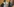 Der Angeklagte Felix F. hält sich zum Schutz vor Fotografen eine Zeitung vors Gesicht