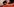 Ein Baby im Arm seiner Mutter
