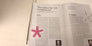 Aufgeschlagene Hinz&Kunzt-Ausgabe mit Pro und Contra zum Genderstern