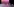 Die Bühne ist leer, der Hintergrund pinkfarben. Acht Tänzerinnen sind in Bewegung zu sehen