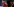 Ministerpräsidentin Malu Dreyer sitzt in einem Fernsehstudio in Wohnzimmer-Look