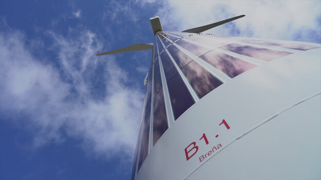 Mit Solarfolien beklebter Turm eines Windrads Mit Solarfolien beklebter Turm eines Windrads