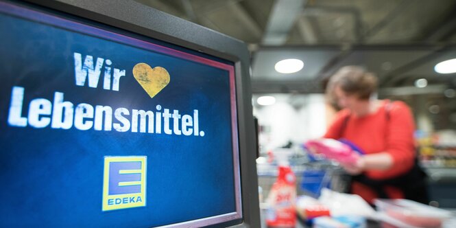 "Wir lieben Lebensmittel"- Schild bei Edeka