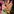 Eine Hand greift in Stoff