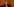 Jens Spahn sitzt mit Maske hinter einem Pult mit Mikrofon