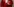 Eine Person in einer Richterrobe ist von nahem fotografiert. Der Bildausschnitt zeigt nur den Oberkörper und ein Gesetzesbuch und einen Schnellhefter, die von der Person unter den Arm geklemmt wurden.
