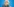 Christine Lambrecht vor blauem Hintergrund. Sie ist eine ältere Frau mit lockigen blonen Haaren, die ir bis zur Schulter reichen. Sie trägt eine Brille.