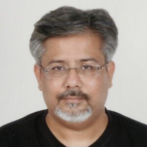 Karikaturist Manjul.