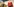 Szene aus "Verlorene Liebesmühe!": Eine Figur mit Schnurbart wedelt mit einer kleinen Gitarre, eine Figur im Pagenanszug schaut mit aufgerissenem Mund in die Kamera