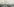 Gemälde, auf dem ein grünlicher Deich und im Hintergrund hohe Sendemasten zu sehen sind