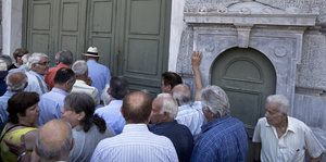 Pensioners in front of a bank in Athens