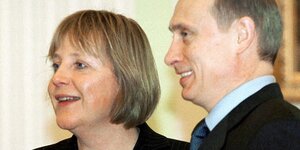 Die junge Angela Merkel und Vladimir Putin
