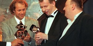 Drei Männer bei der Verleihung des Grimme-Preises 1996.