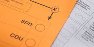 Gelber Stimmzettel mit SPD und CDU Kästchen