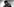 Le Scratch Perry am Mikrofon schmuckbehangen und einer geschmückten Kappe