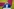 Rene Domke steht an einem Rednerpult und spricht