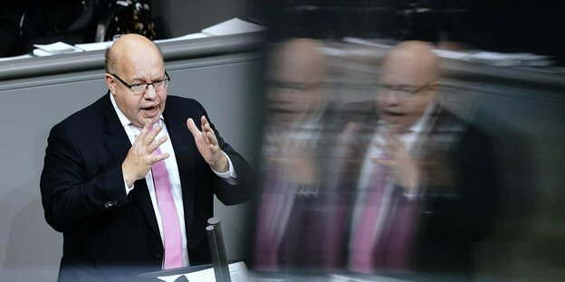 Peter Altmaier an einem Rednerpult Peter Altmaier an einem Rednerpult