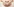 Zwei Hände auf einem schwangeren Bauch formen ein Herz