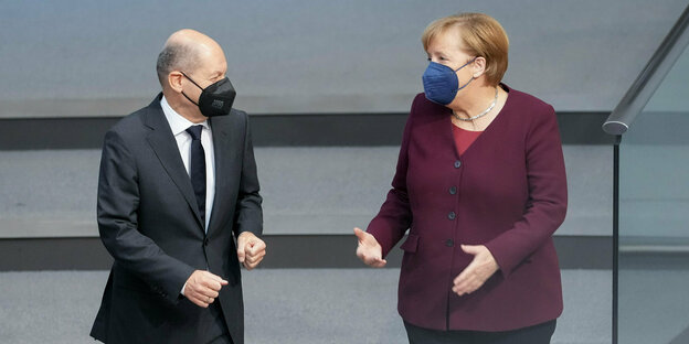 Olaf Scholz und Angela Merkel.