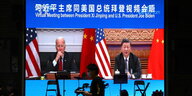 Joe Biden und Xi Jin Ping sind nebeneinander auf einem Bildschirm zu sehen