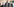 Heiko Maas mit schwarzer Maske und Anzug auf dem Weg zur ersten Fraktionssitzung der SPD nach der Bundestagswahl. Hinter ihm laufen ebenfalls Menschen mit Anzug und Maske