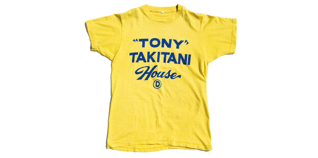 Gelbes T-shirt mit der Aufschrift Tony Takitani House