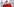 Kardinal Woelki trägt ein rotes Gewand und einen weißen Mundschutz