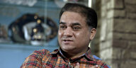 Portraitfoto von Ilham Tohti
