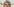 IOC-Chef Thomas Bach sitzt in einer Pressekonferenz