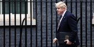 Boris Johnson im Anzug und mit offenem Mund